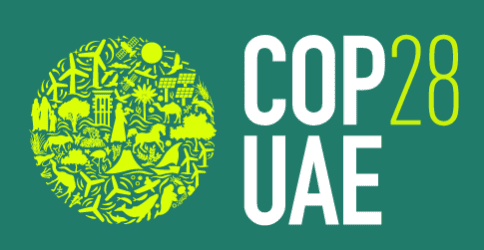 El logotipo de la COP 28 de los Emiratos Árabes Unidos con la Conferencia y las Naciones Unidas sobre un fondo verde.